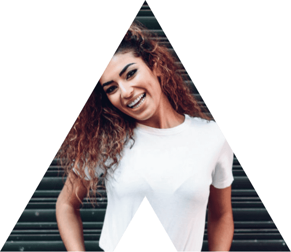A smiling woman in a triangle